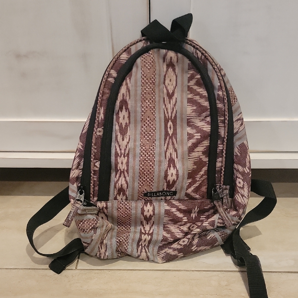 Patterned Backpack With Black Accents - image 1